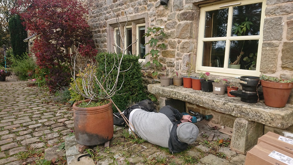 oring out wall samples for WUFI analysis in order to understand wall insulation strategy for a phased retrofit of an 1800s sandstone detached house near Preston