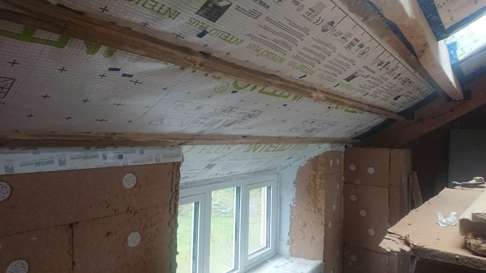 Airtightness layer and service void in roof of bedroom - phased retrofit of an 1800s sandstone detached house near Preston