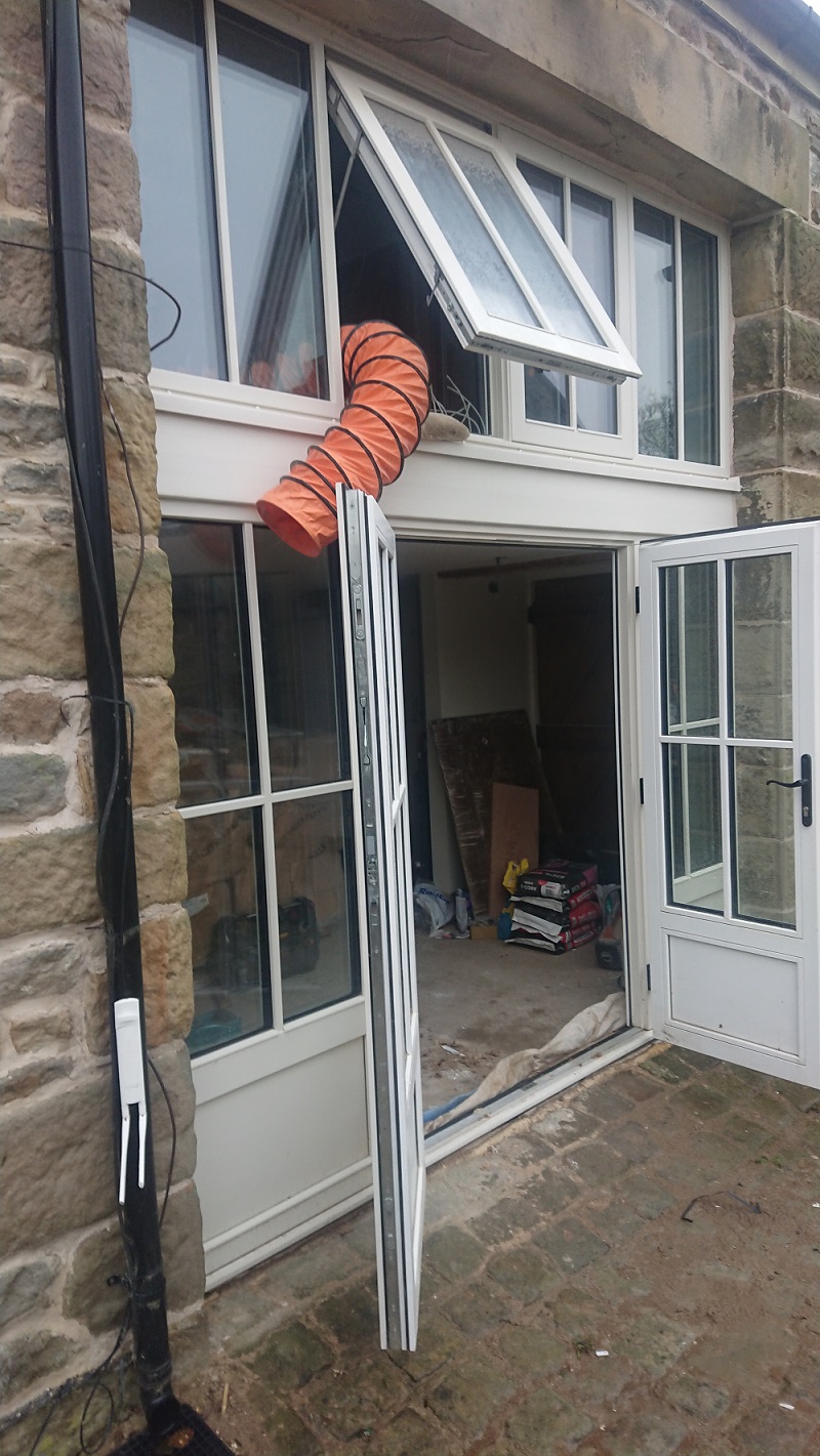 New doors & windows spanning intermediate floor - phased retrofit of an 1800s sandstone detached house near Preston